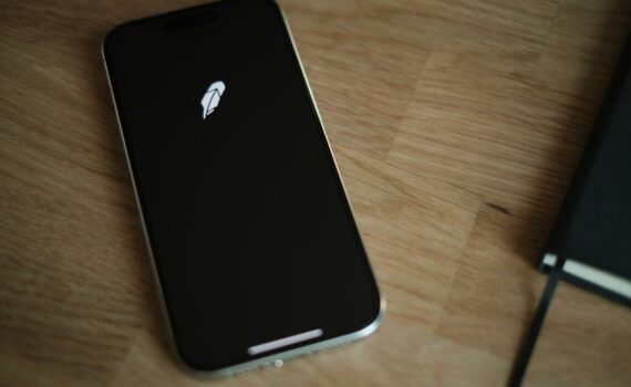 A close up of a cell phone on a table