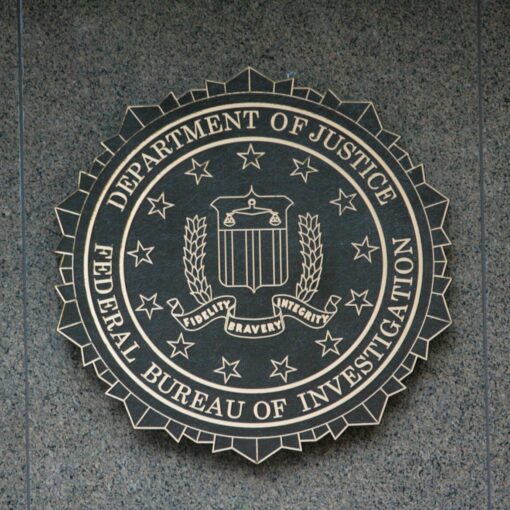 the seal of the department of justice on a wall