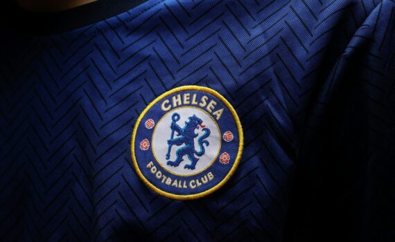 a close up of the chelsea badge on a shirt